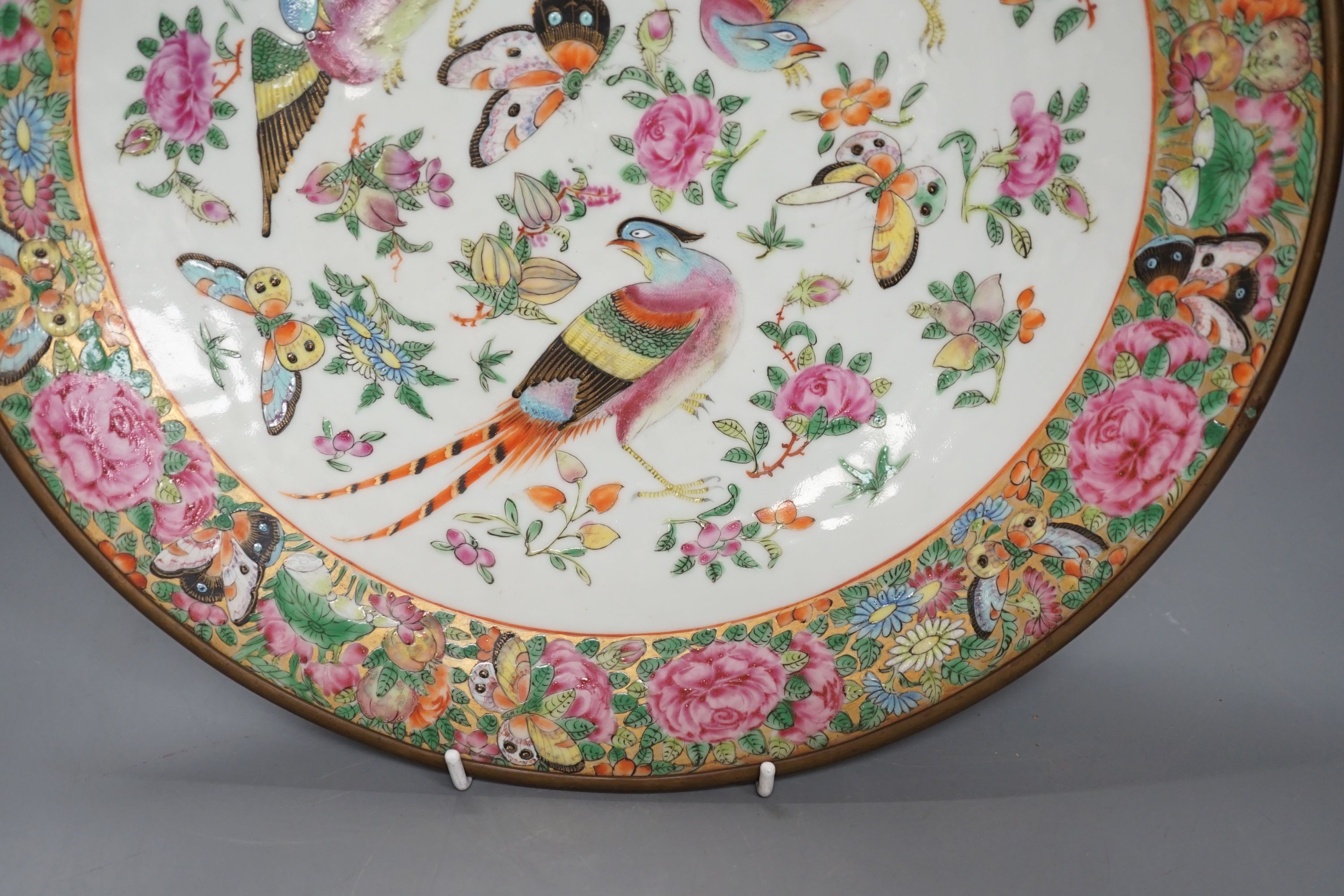 A 19th century Chinese famille rose ‘birds insects fruit and flowers’ dish - 35cm diameter